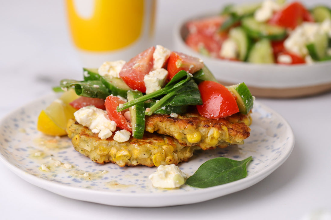 Sweetcorn Fritters with Cucumber, spinach, Tomato Feta Salad