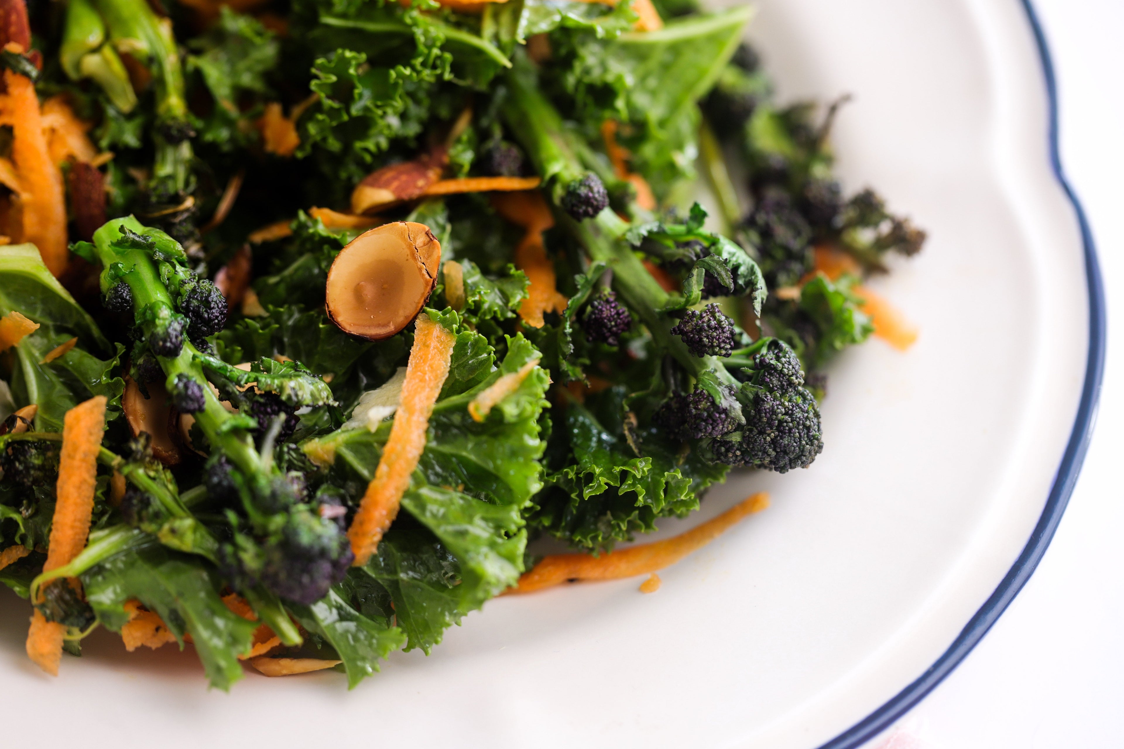 Purple Sprouting Broccoli, Kale, Almond & Carrot Salad with Lemon Dressing